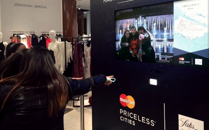 Saks users interacting with experience